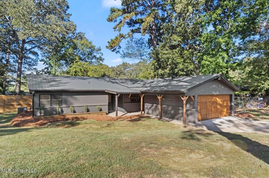 Carport Ranch after renovation — cedar gray